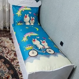 روتختی یک نفره زمینه ابی اسمانی روتختی کارتونی طرح دوچرخه